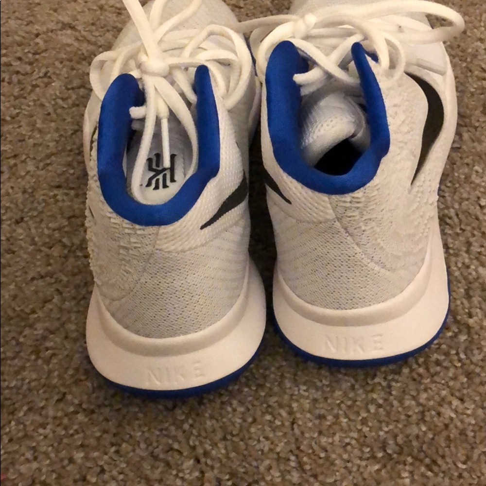 New pair of kids Kyrie Irving b-ball sneakers.